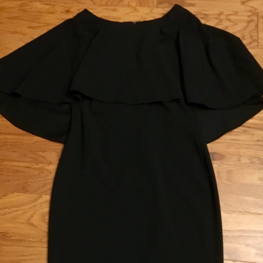 Cape black sheath dress.